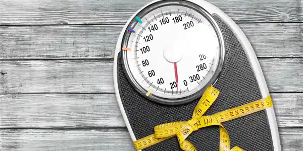 Scale with measuring tape